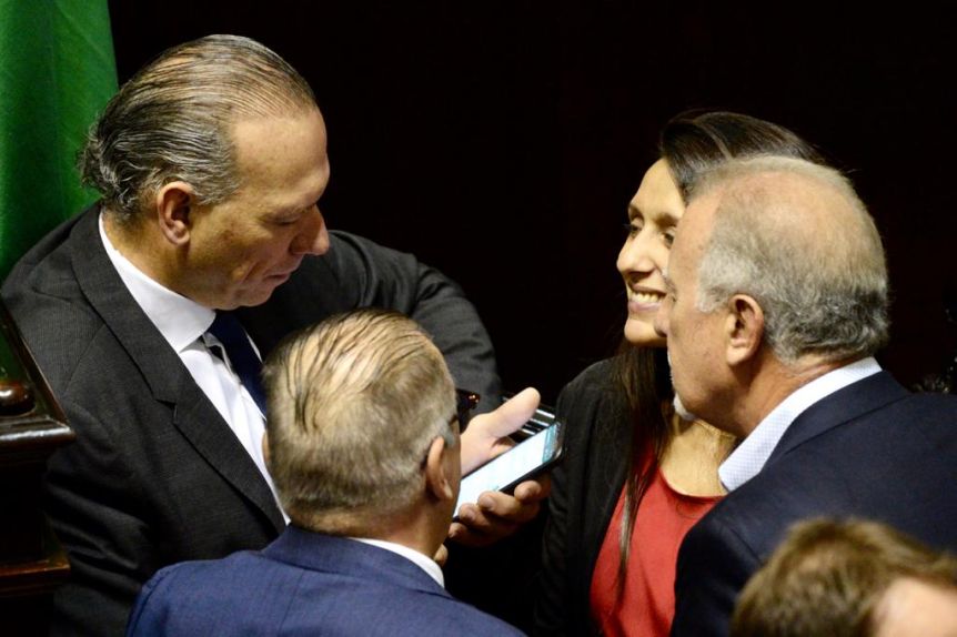 El color de la asunción: León y Andrés, la corbata, invitados y el agosto de los vendedores